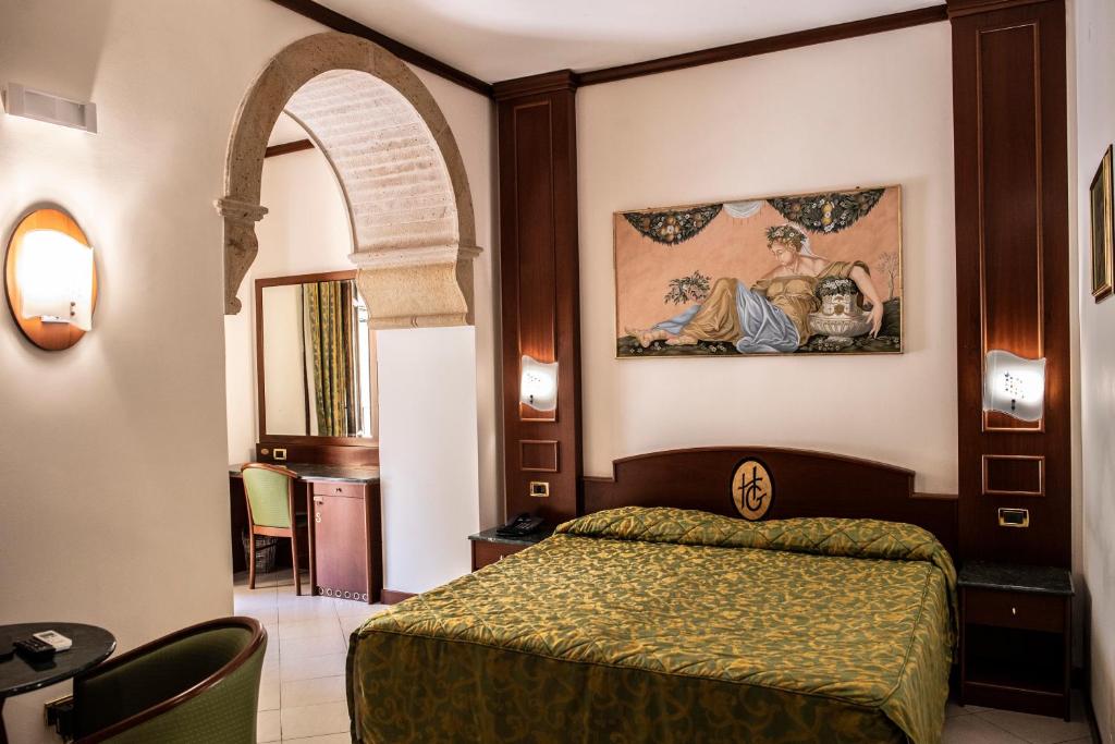 Posteľ alebo postele v izbe v ubytovaní Hotel Garibaldi