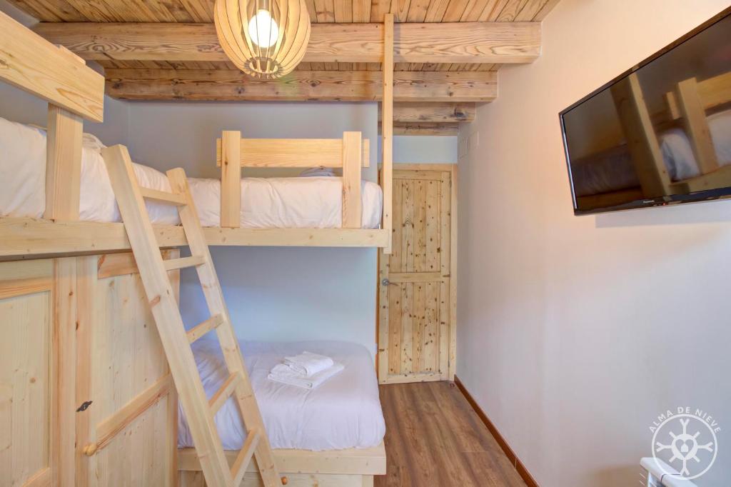 Posteľ alebo postele v izbe v ubytovaní CASA ERA CUMA de Alma de Nieve