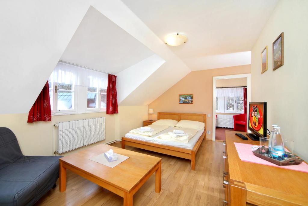 Postel nebo postele na pokoji v ubytování Hotel Erika