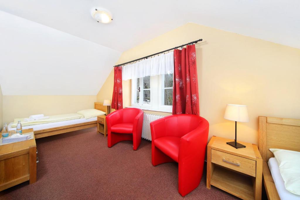 Postel nebo postele na pokoji v ubytování Hotel Erika