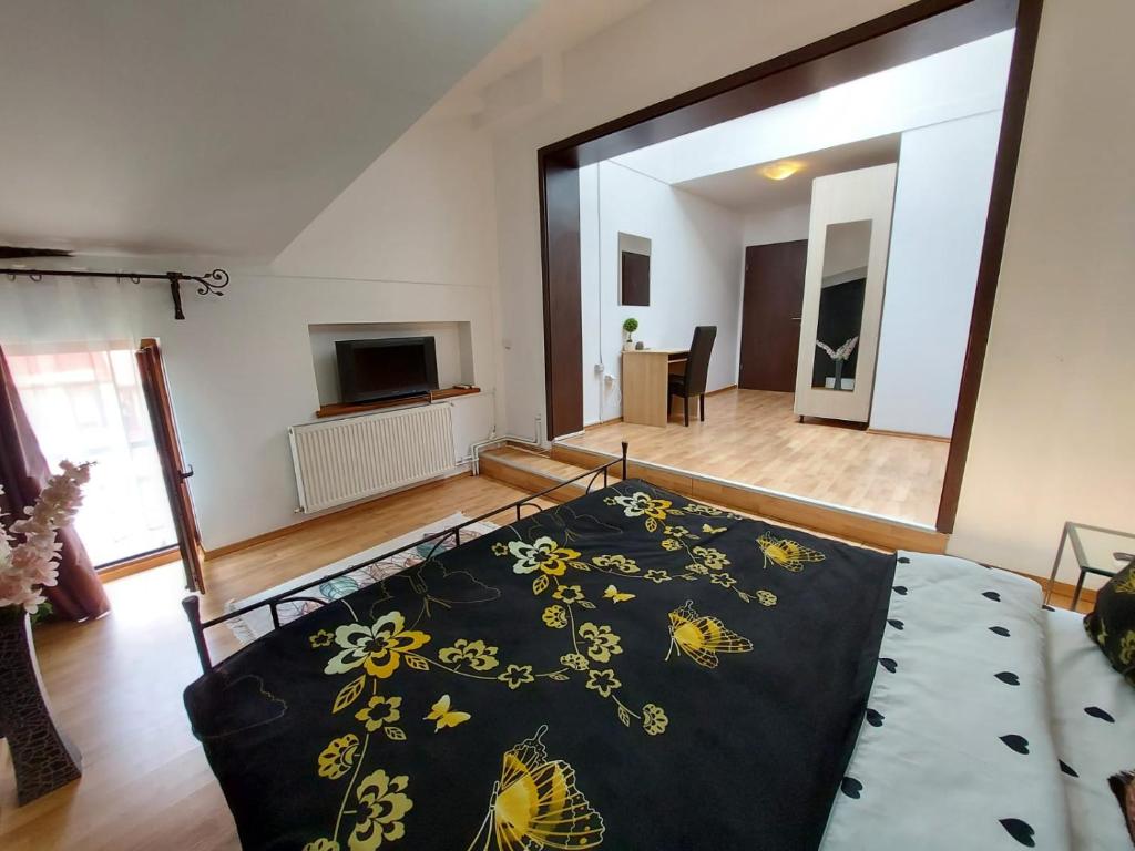 TV a/nebo společenská místnost v ubytování Happy Accomodation