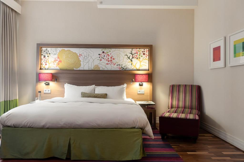 Postel nebo postele na pokoji v ubytování Elite Hotel Esplanade