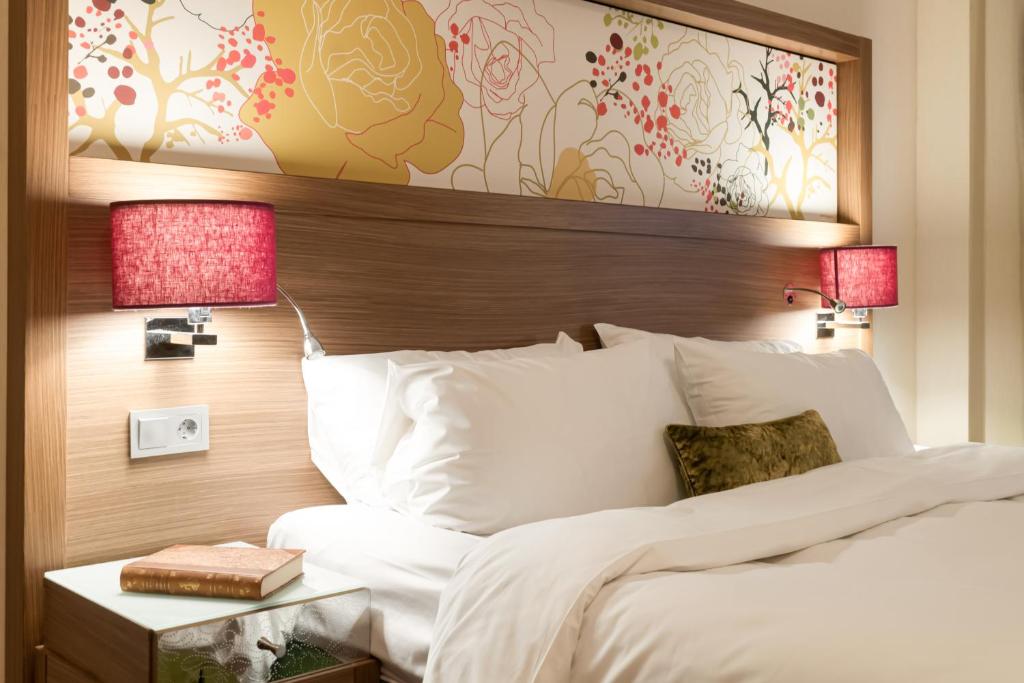 Postel nebo postele na pokoji v ubytování Elite Hotel Esplanade