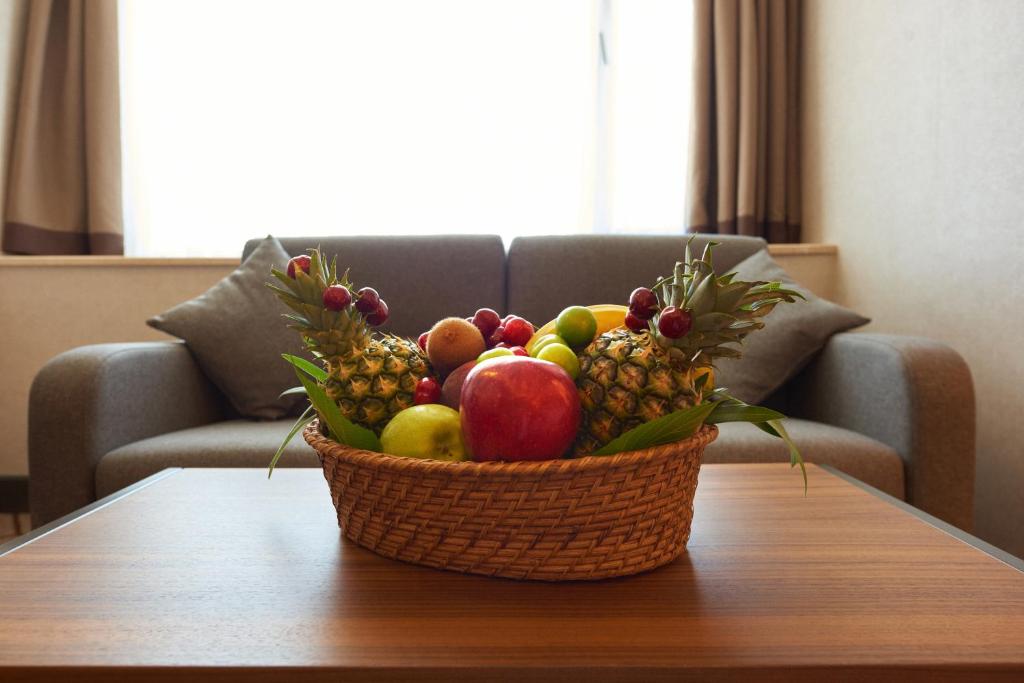 a basket of fruit sitting on a table at Grand Hotel Gulsoy Old City in Istanbul