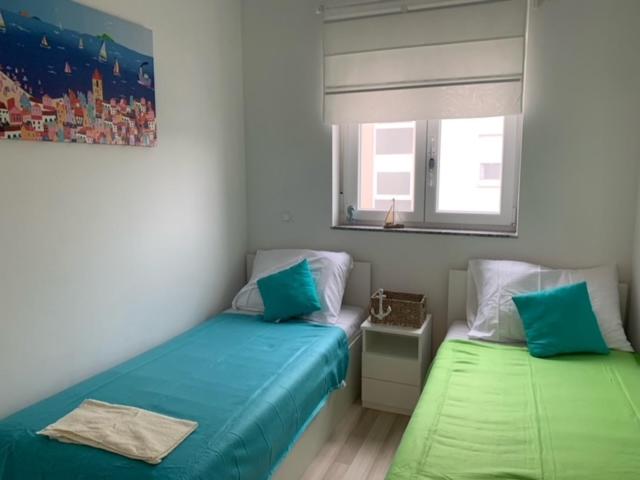 Krevet ili kreveti u jedinici u objektu Turquoise Apartments unit 1