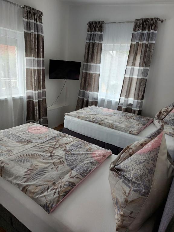 Posteľ alebo postele v izbe v ubytovaní Ferienhaus Vagner