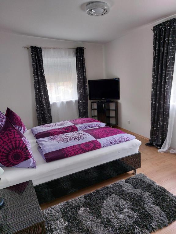 Posteľ alebo postele v izbe v ubytovaní Ferienhaus Vagner