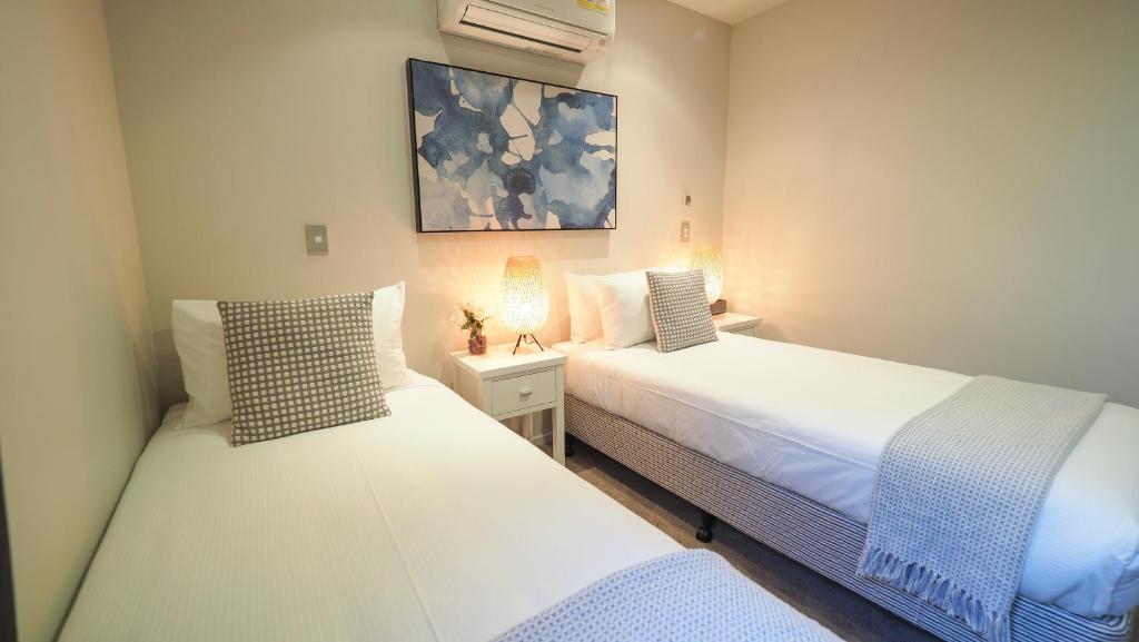 Postel nebo postele na pokoji v ubytování Colombo Lodge Hotel