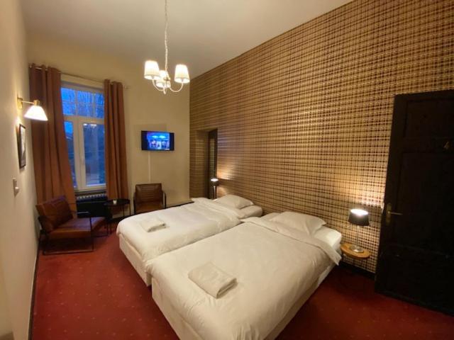 Postel nebo postele na pokoji v ubytování Le Tri Renard Spa