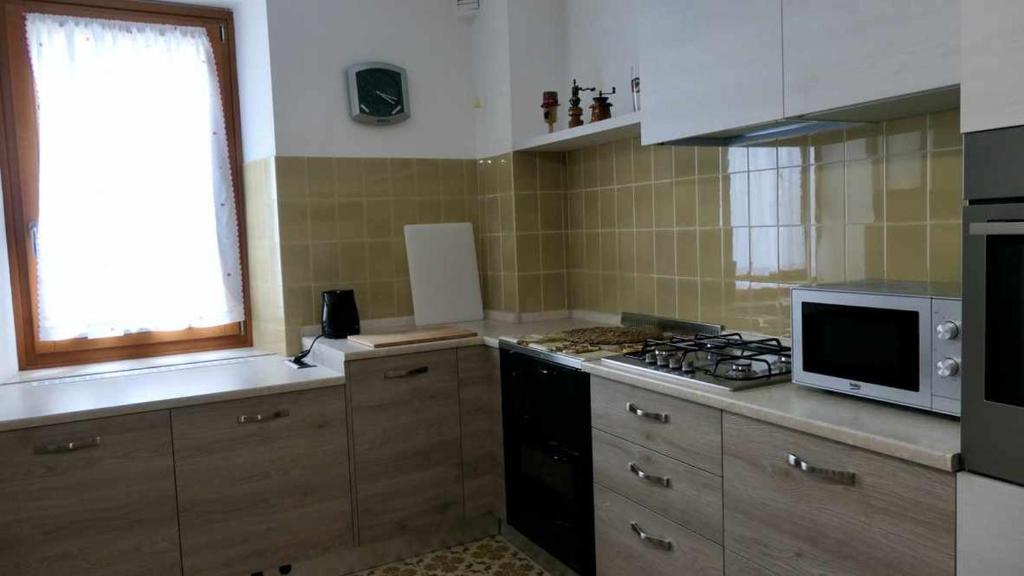Kuchyňa alebo kuchynka v ubytovaní Casa alla Cantinota Padergnone Ospitar