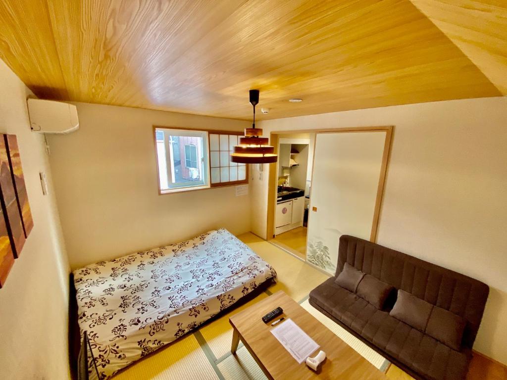 Postel nebo postele na pokoji v ubytování Hotel EL Shinjuku 6