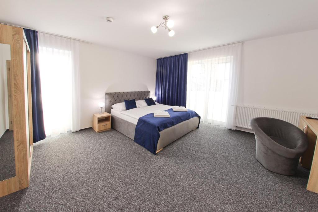 Postel nebo postele na pokoji v ubytování Hotel Prístav
