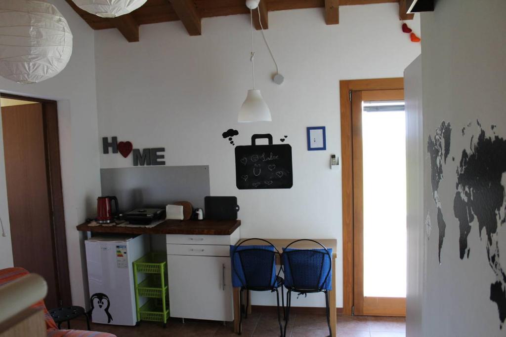 Kuchyň nebo kuchyňský kout v ubytování Villa Madi