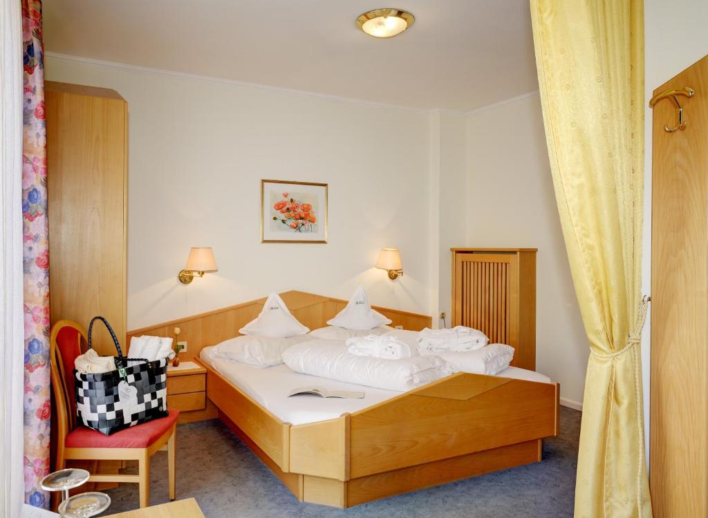 Postel nebo postele na pokoji v ubytování Hotel Dorner B&B