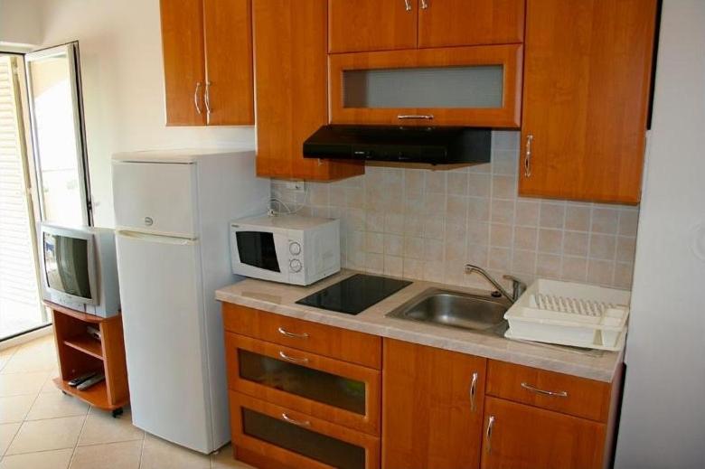 Kuchyň nebo kuchyňský kout v ubytování Villa Planjka (133)