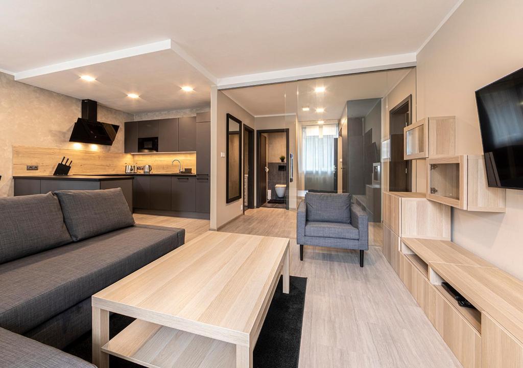 Telewizja i/lub zestaw kina domowego w obiekcie Gesto Apartments