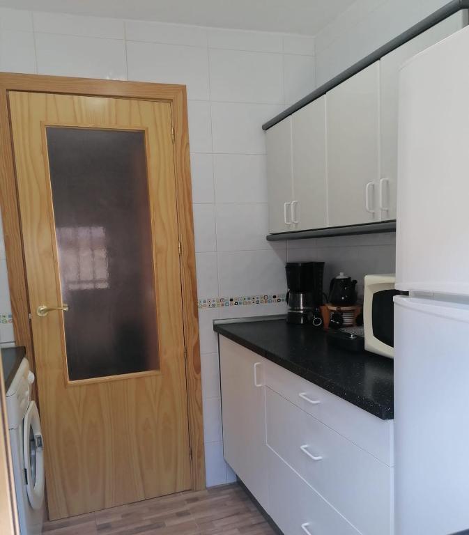 Kuchyň nebo kuchyňský kout v ubytování LA CASA DE LA ABUELA DESI