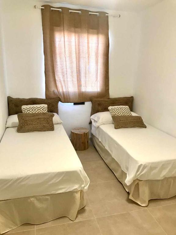 Posteľ alebo postele v izbe v ubytovaní Adosado Las Gaviotas Casa completa