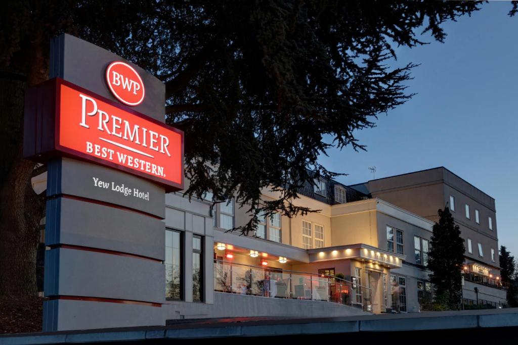 a building with a sign that reads premier best western at Best Western Premier EMA Yew Lodge Hotel in Castle Donington