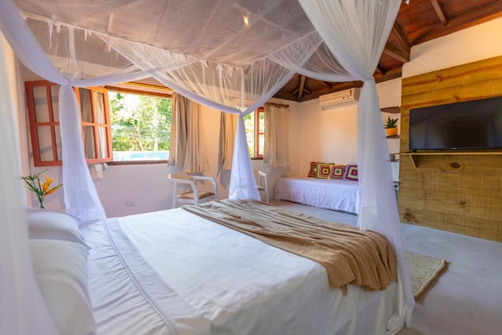 Ένα ή περισσότερα κρεβάτια σε δωμάτιο στο La hospedaria