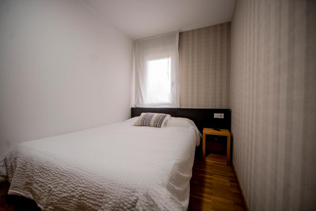 Posteľ alebo postele v izbe v ubytovaní Noja Rooms