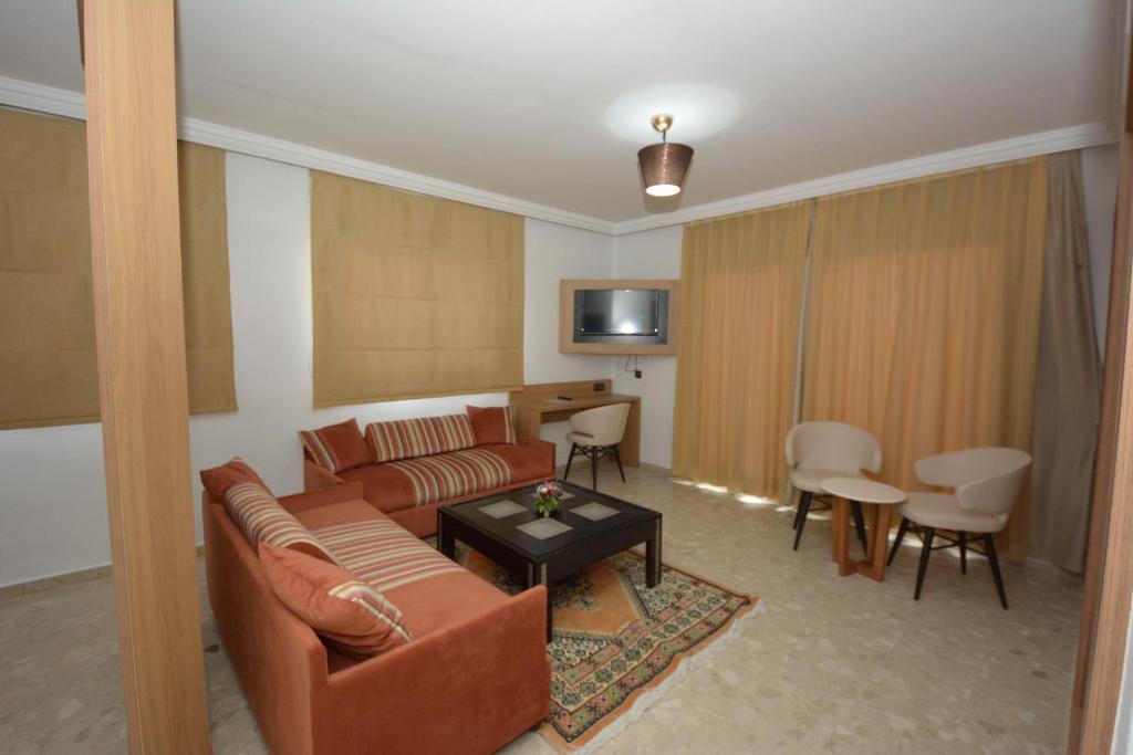 Posezení v ubytování Oasis Hotel & Spa