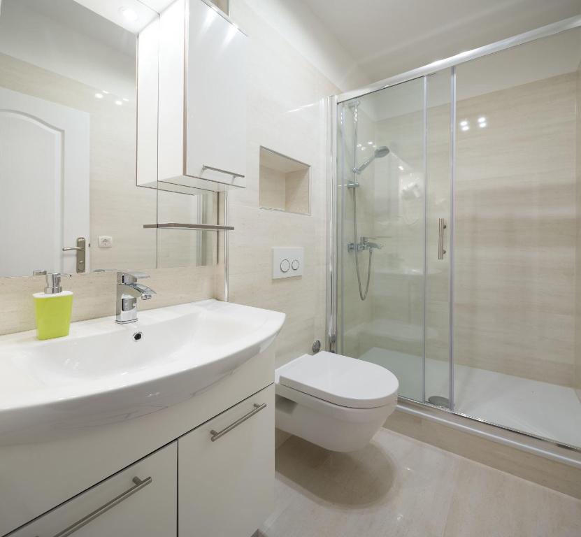 Koupelna v ubytování Riva Rooms