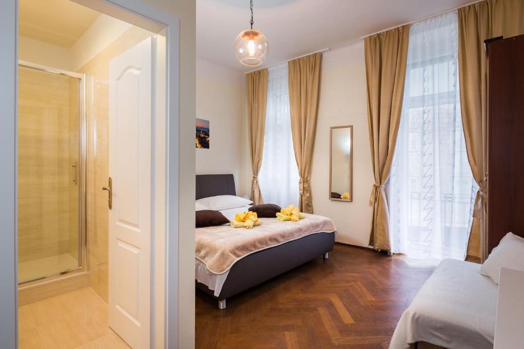 Postel nebo postele na pokoji v ubytování Riva Rooms