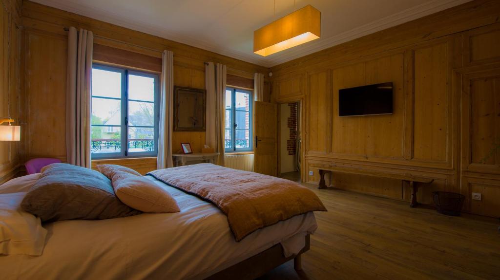 Postel nebo postele na pokoji v ubytování A L'ecole Buissonniere