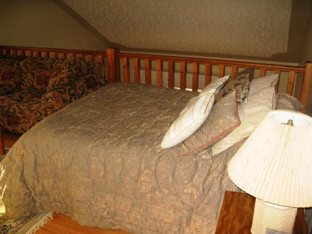 Postel nebo postele na pokoji v ubytování McDougall Lane Bed & Breakfast