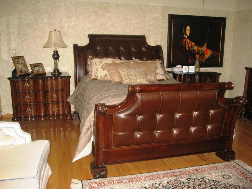 Postel nebo postele na pokoji v ubytování McDougall Lane Bed & Breakfast