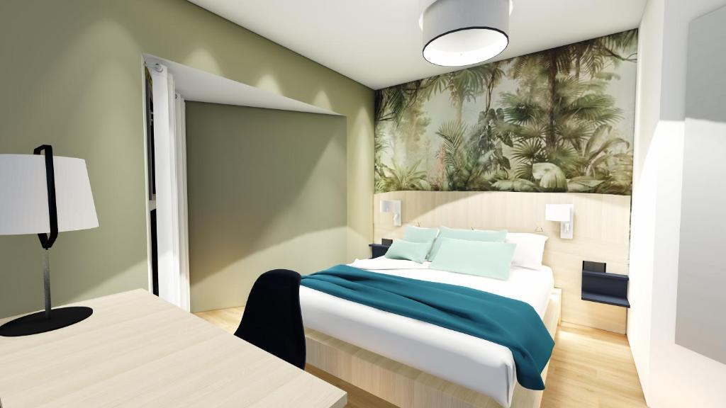 Postel nebo postele na pokoji v ubytování Logis Hôtel Restaurant Le Chêne Vert