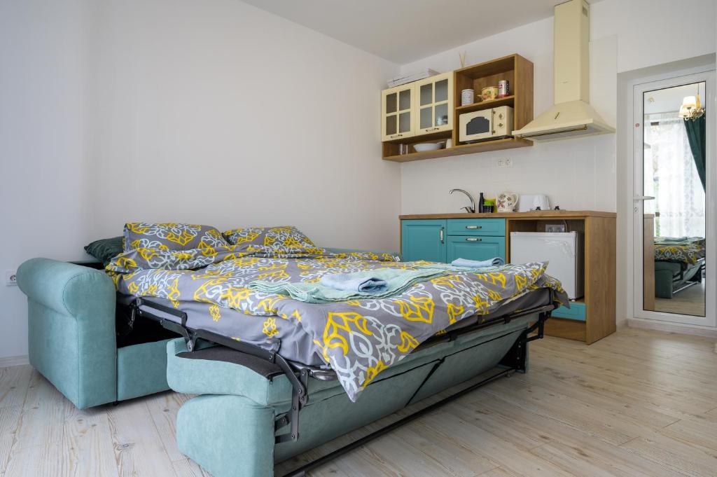A bed or beds in a room at Retro Studio byPMM
