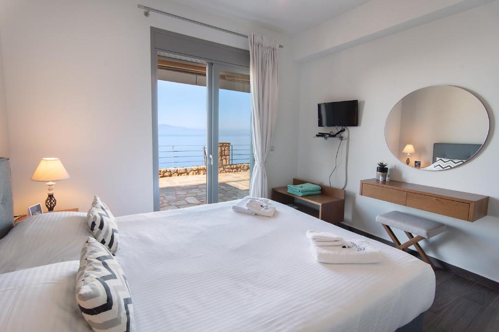 Posteľ alebo postele v izbe v ubytovaní Bay View GuestHouses