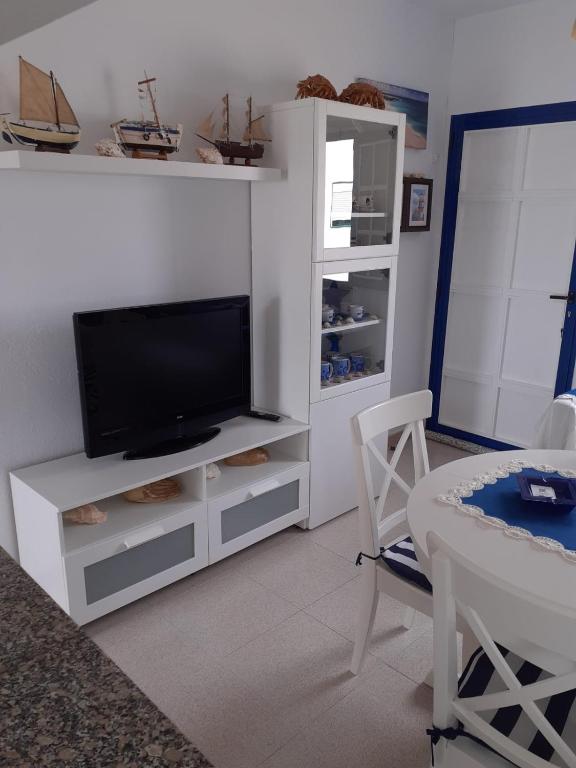 TV a/nebo společenská místnost v ubytování Casa El Salao