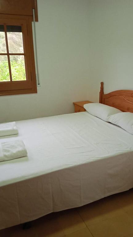 Postel nebo postele na pokoji v ubytování Mas de l'Assut