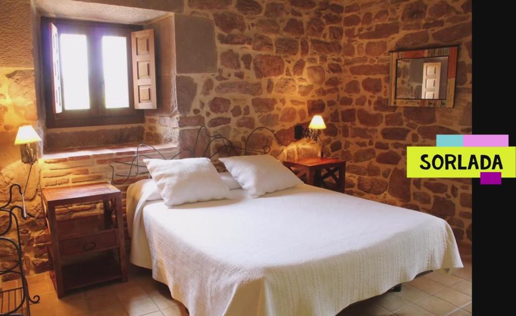 Postel nebo postele na pokoji v ubytování Hostal Rural Ioar