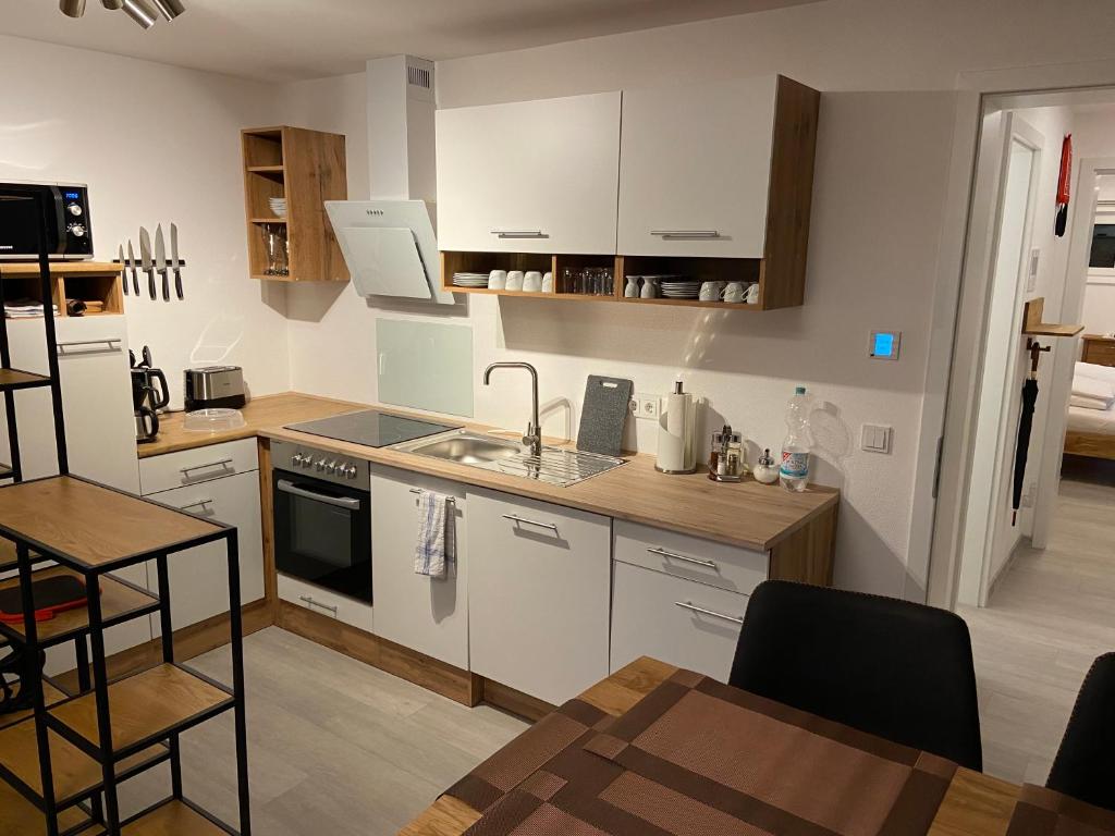 Η κουζίνα ή μικρή κουζίνα στο Haus Langweid - Moderne Ferienwohnungen mit Luxus im Inntal