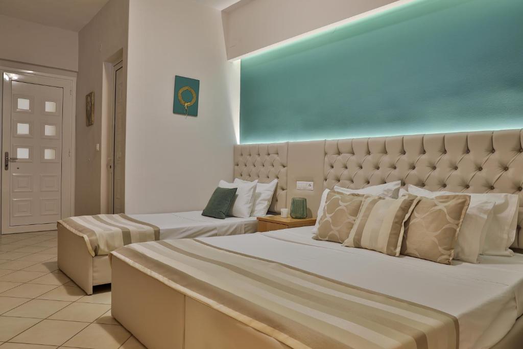Postel nebo postele na pokoji v ubytování Irida Apartments