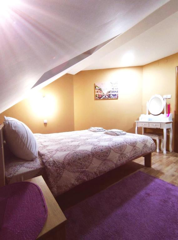 Postel nebo postele na pokoji v ubytování Apartmani Milošević