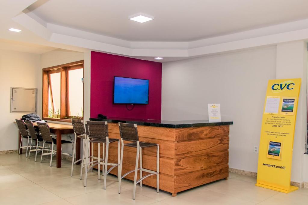 TV a/nebo společenská místnost v ubytování Coroa Vermelha Beach - All Inclusive