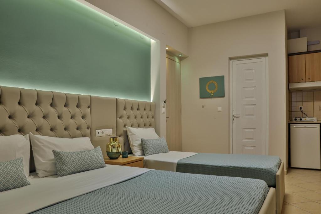 Postel nebo postele na pokoji v ubytování Irida Apartments