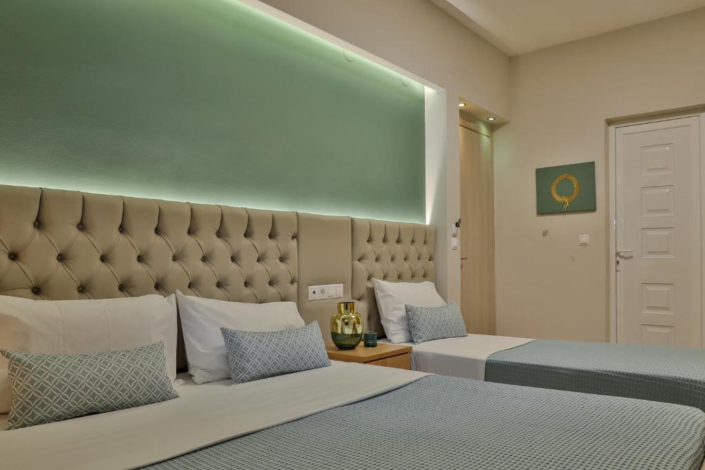 Postel nebo postele na pokoji v ubytování Irida Apartments