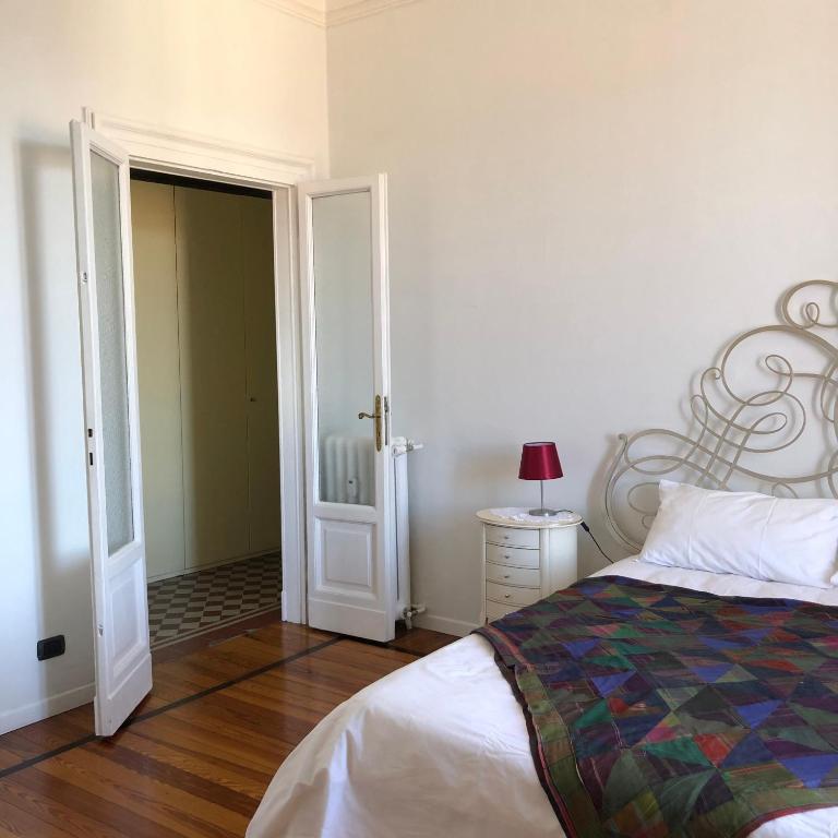 A bed or beds in a room at Sant'Ambrogio with charme
