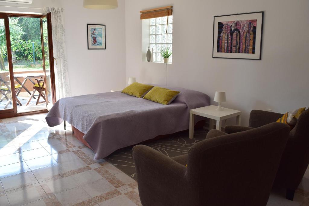 Posteľ alebo postele v izbe v ubytovaní Lovely apartment with two terraces***