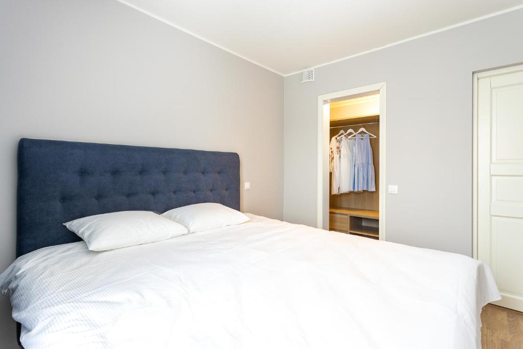 Postel nebo postele na pokoji v ubytování Maia Residence