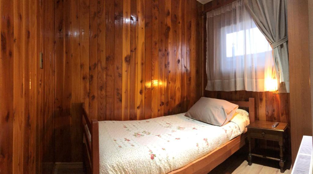 Postel nebo postele na pokoji v ubytování Hostal Graciela