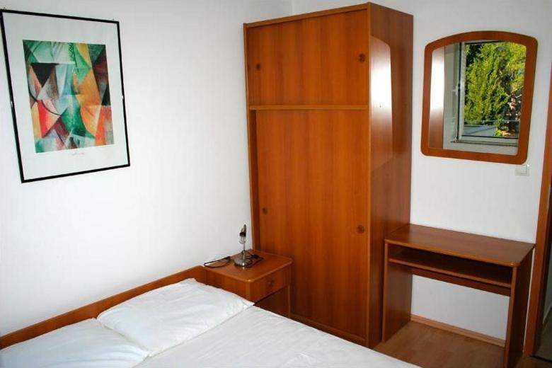 Postel nebo postele na pokoji v ubytování Villa Planjka (133)
