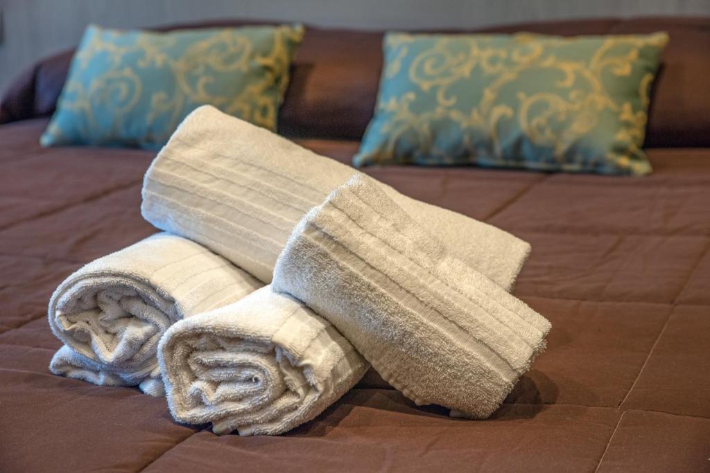 A bed or beds in a room at Nanà