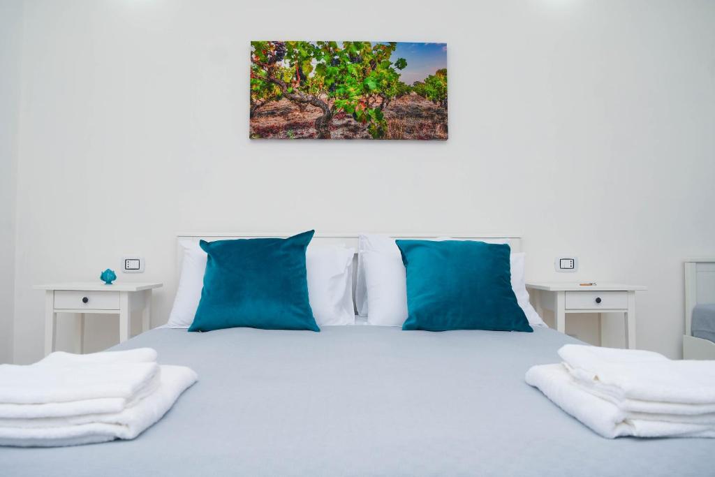 Postel nebo postele na pokoji v ubytování B&B Benefici